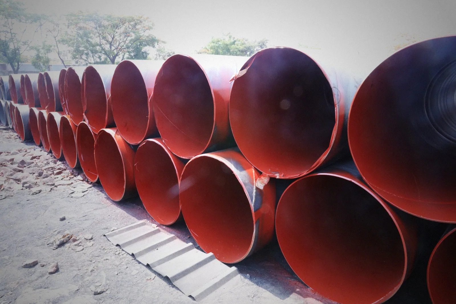 Stack of large-diameter HSAW pipes at MTL Pipes stockyard
